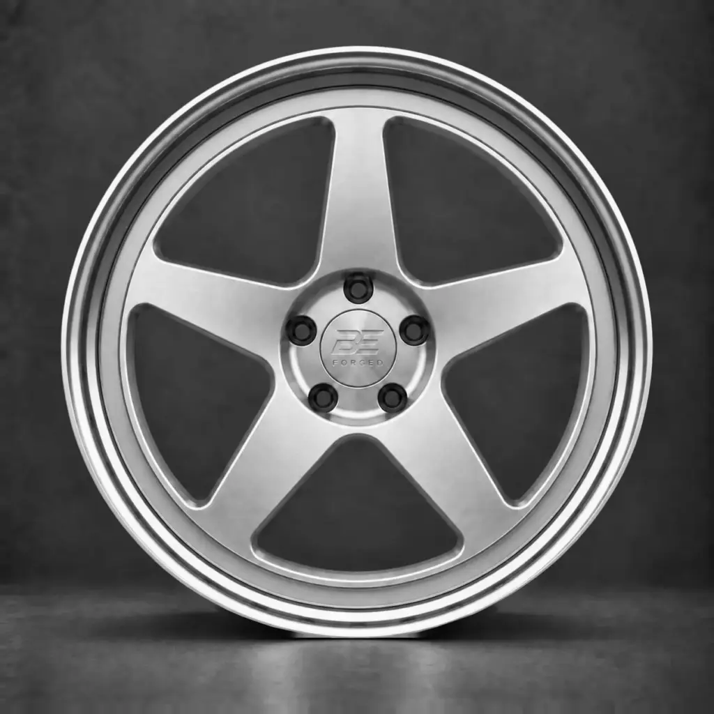 BE FORGED five-spoke multi-piece wheel with hidden hardware, recessed outer face ring and polished step lip.