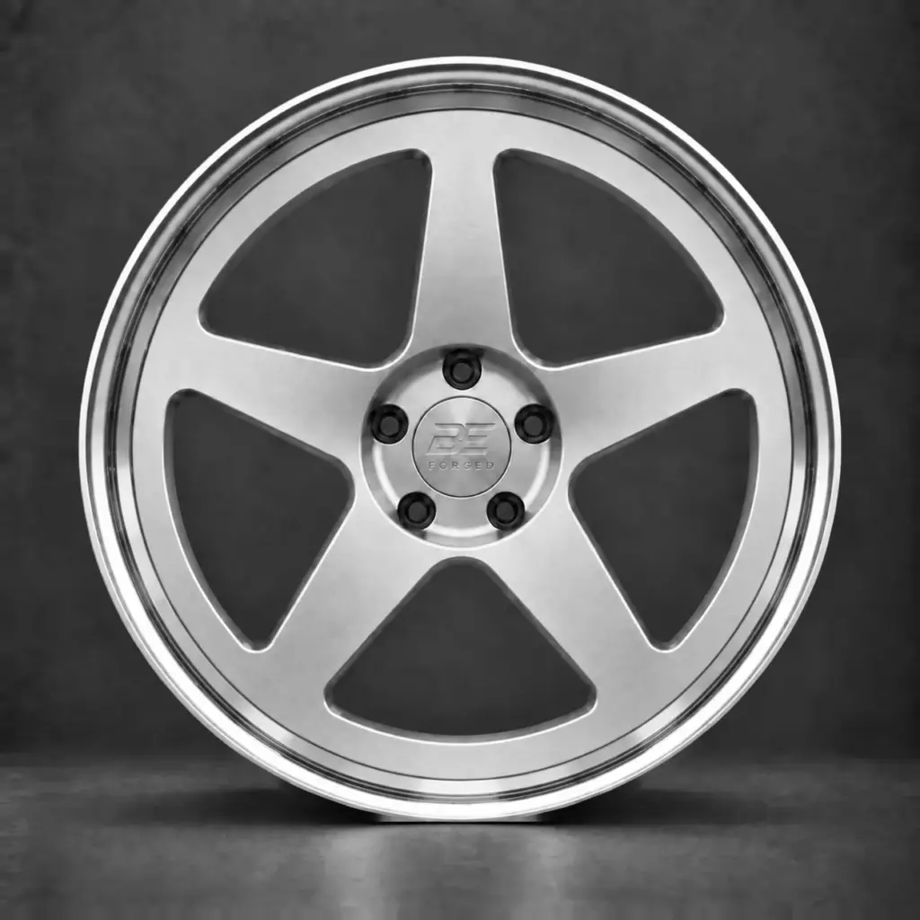 BE FORGED five-spoke multi-piece wheel with hidden hardware and a smooth flush face ring inside the polished step lip.