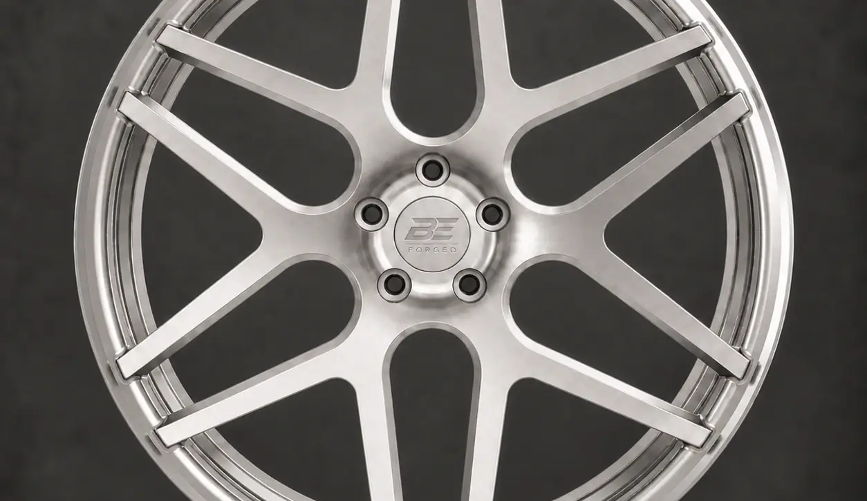 BE1-CM6 monoblock forged wheel — brushed silver front view